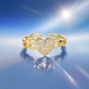 A golden heart-shaped diamond-encrusted ring is a fashionable and simple luxury jewelry accessory for women details Picture